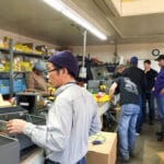 Group of people in warehouse
